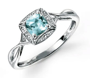 White gold aquamarine and diamond twist ring from John Greed Jewellery 