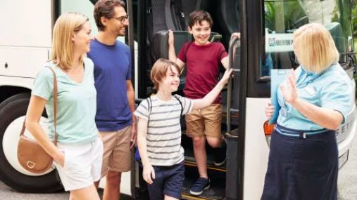 TUI family getting off coach 